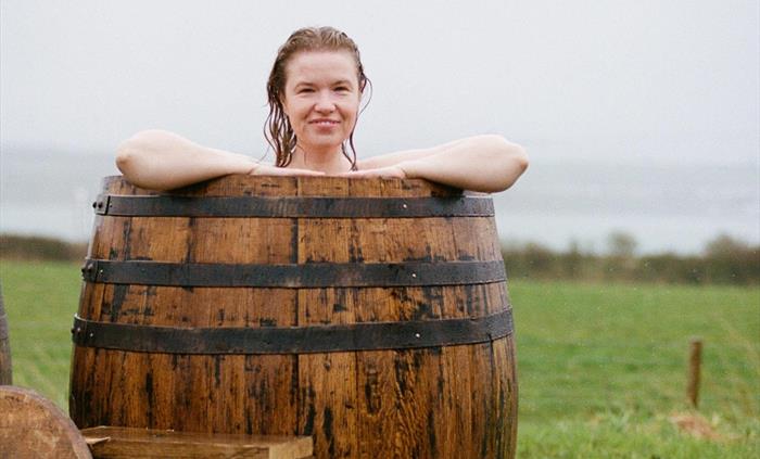 An outdoor bathing experience. Wild seaweed baths by Halen Môn, the first in Wales. Soak in the restorative power of seaweed.